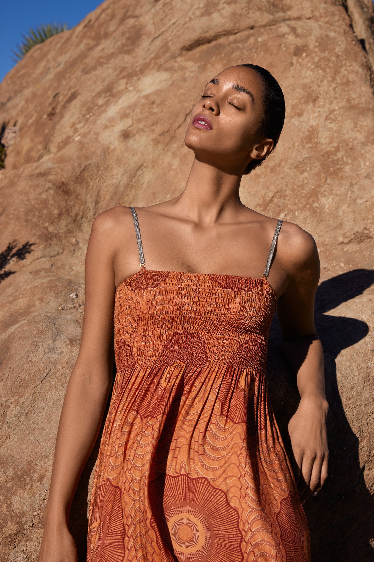 Gaia in African Peacock Print in Burnt Sienna